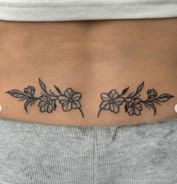 16. Hibiscus or Tropical Flowers Tattoo