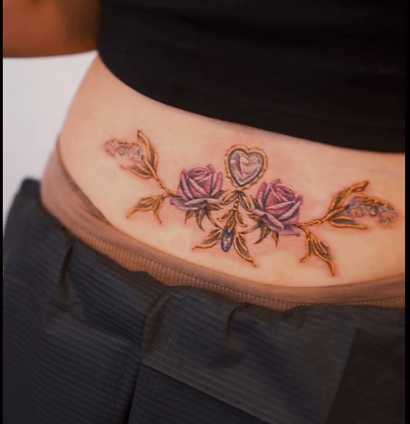 2. Rose With Thorns Trampstamp Tattoo