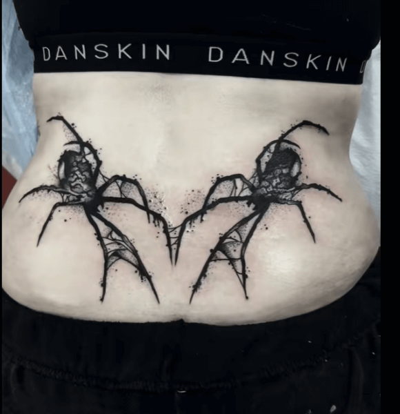 20. Gothic Elements Lower Back Tattoo
