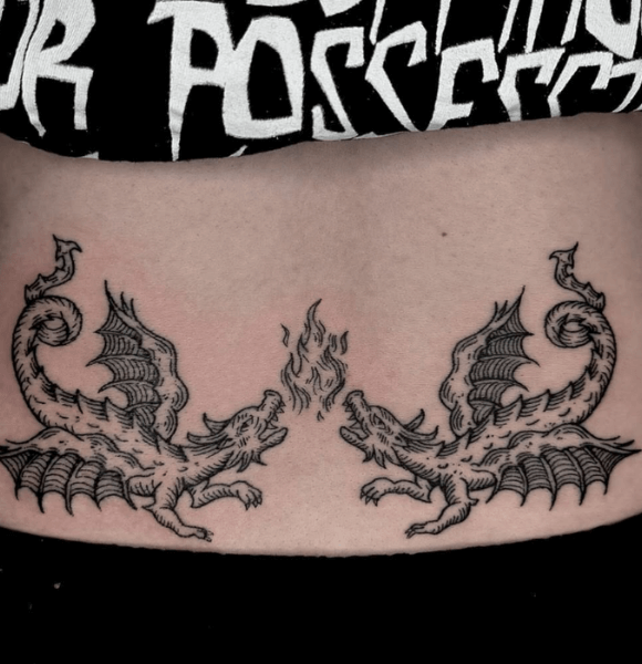 8. Dragon Lower Back Tattoo