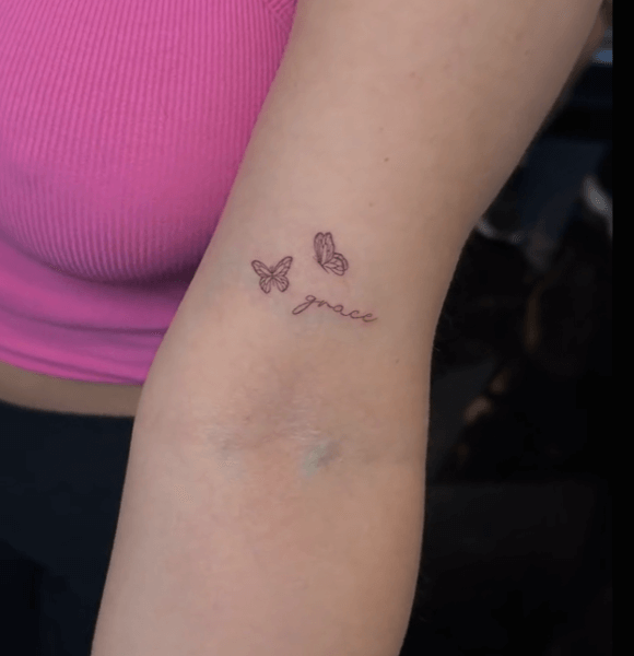 Grace with small butterflies tattoo
