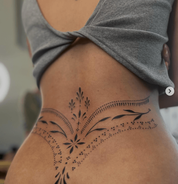 10. Mandala Pattern Lower Back Tattoo
