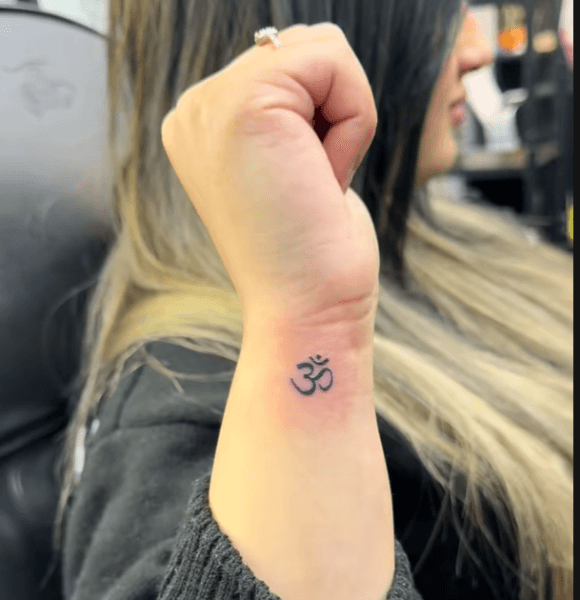 Small Om Symbol Tattoo