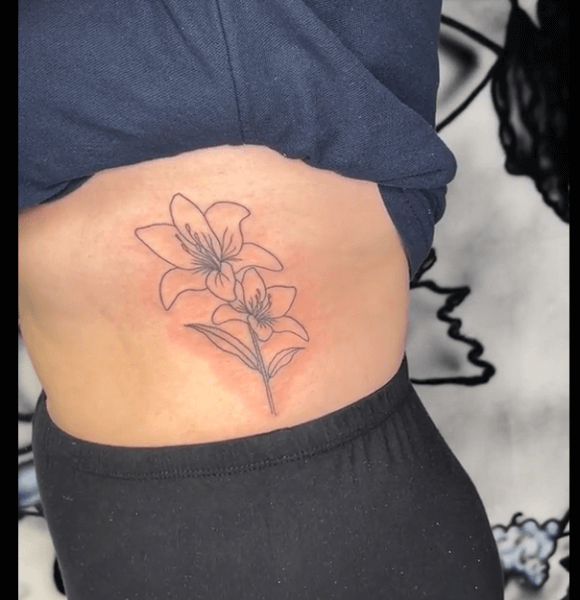 Water Lily Tattoo on Ribcage or side