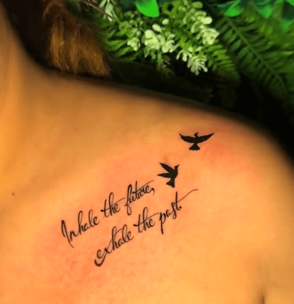 Inhale the future, exhale the past tattoo with deep meaning on the shoulder