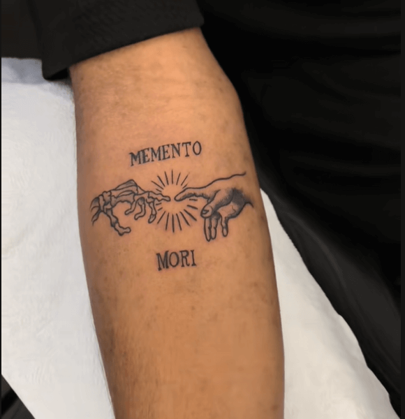 “Memento Mori” (Latin) as one the best tattoos with deep meaning quotes