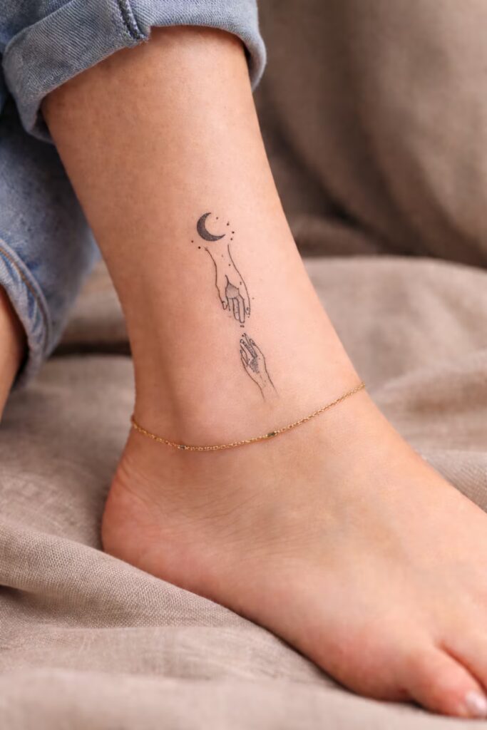 Fine-Line Hands & Crescent Moon Tattoo