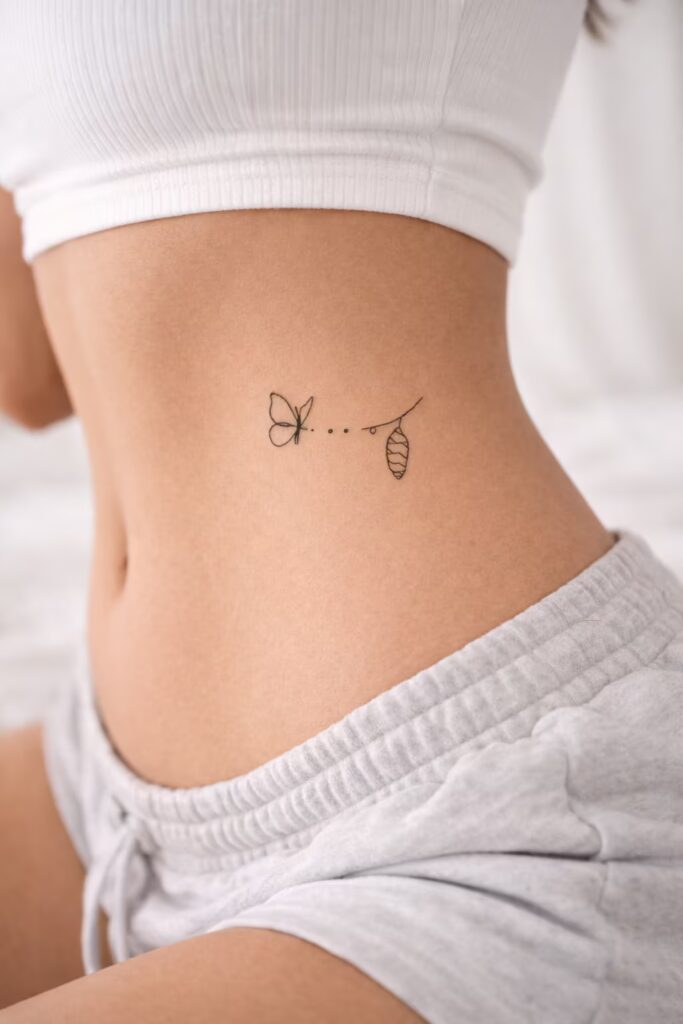 5. Minimalist Butterfly Side Tummy Tattoo for Women