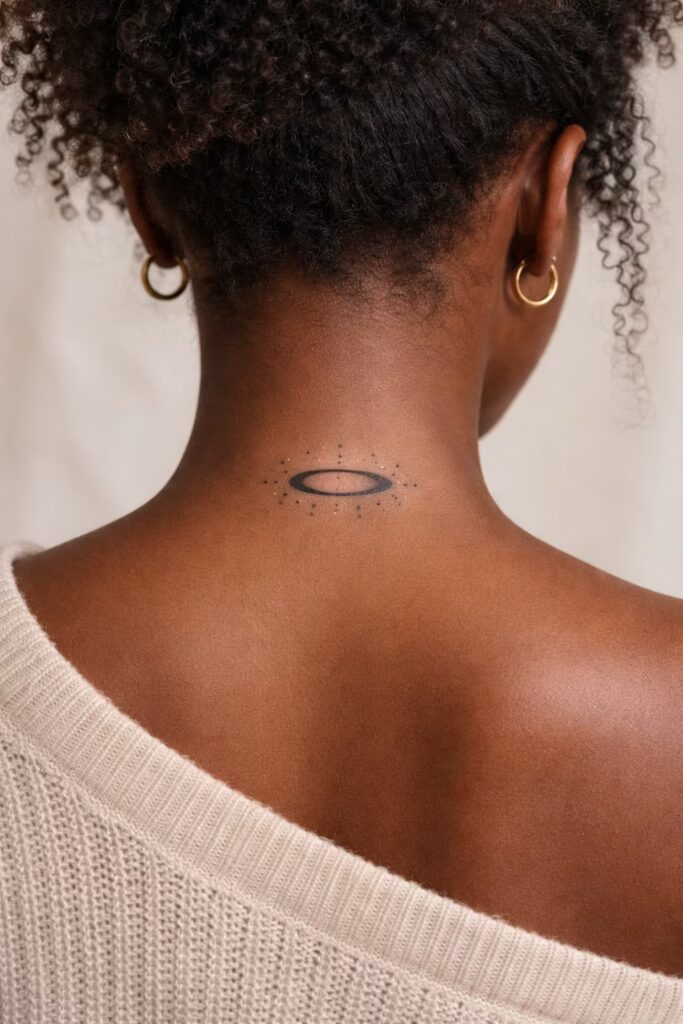 Watercolor Minimalist Halo behind the neck tattoo