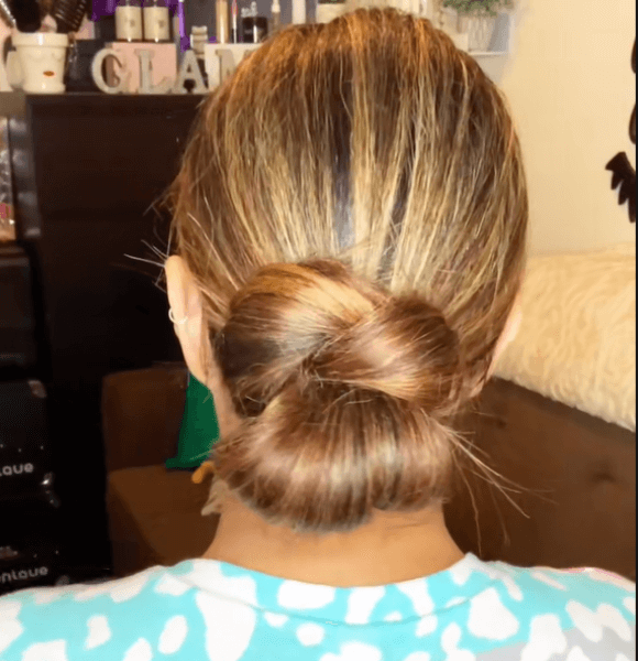 1. The Low Twisted Chignon as one of the Long Thin Hair Hairstyles 