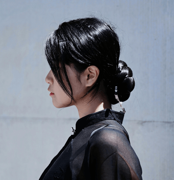 15. Slick Low Bun — Sleek, Not Sad